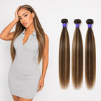 Model posing beside three bundles of P4/27 piano highlight straight human hair extensions on white background